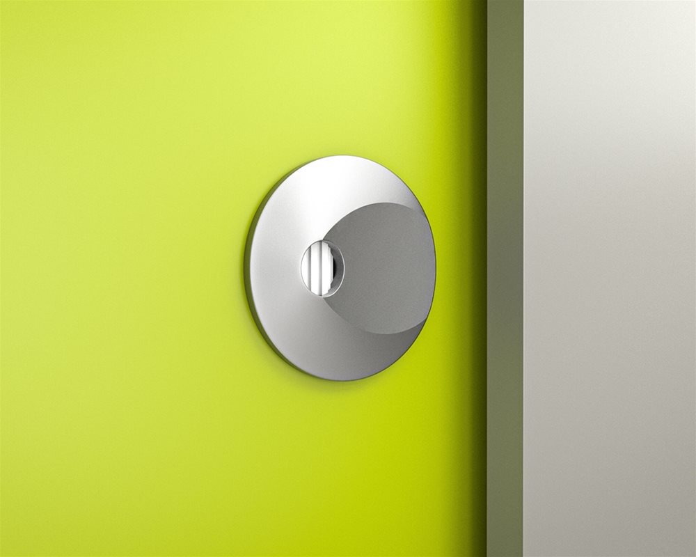 Quadro toilet cubicle with 'Mid Grey' pilaster and 'Lime Green' door with silver lock faceplate