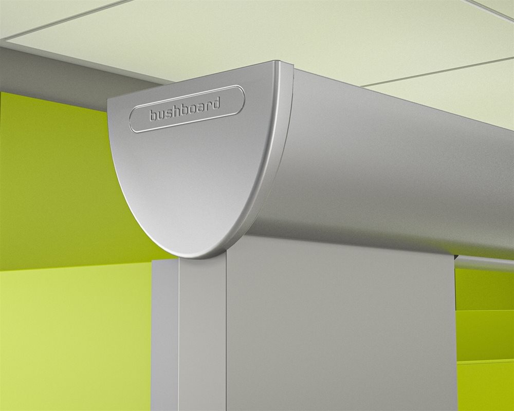 Quadro toilet cubicle with 'Mid Grey' pilaster and 'Lime Green' door with silver headrail