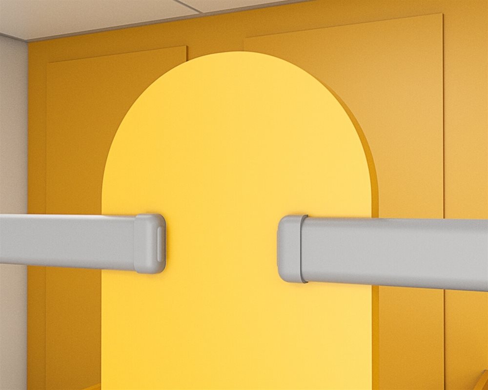 Kids Stuff toilet cubicle with 'Mustard Yellow' colour curved pilaster with silver headrail