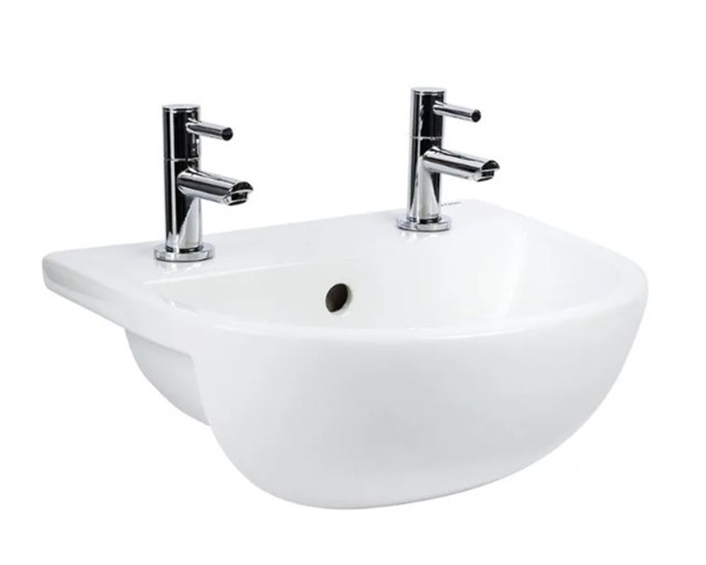 Shenley 400 width slim semi recessed basin with 2 tap holes with lever action taps.
