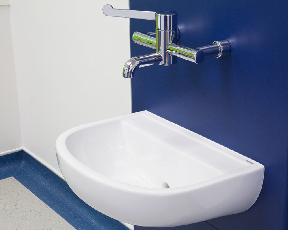 SanCeram clinical basin and mixer tap on blue healthcare boxed out unit.