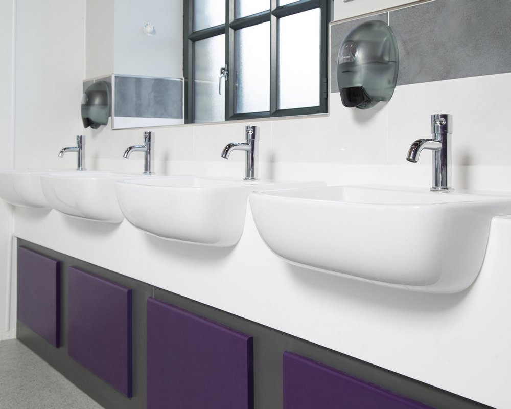 Huddersfield University semi recessed vanity unit with white 'Elysian' solid surface top