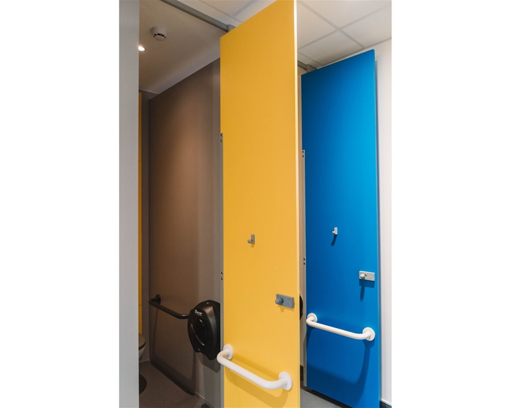 Bushboard Washrooms | HiZone full height school toilet cubicles | Outward opening cubicle door 