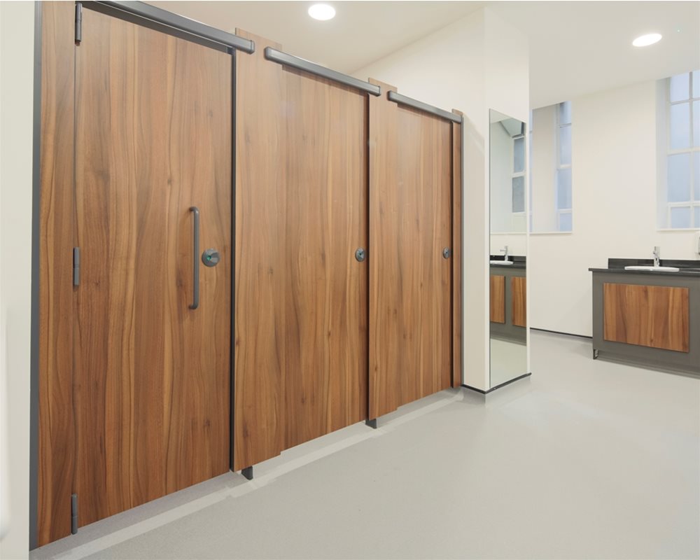 Profiles toilet cubicles in 'American Walnut' laminate for County Hall